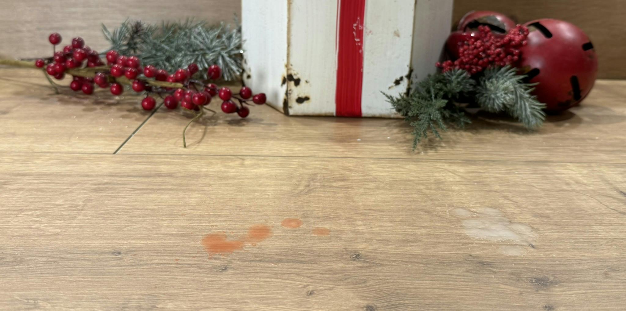 Kerzenwachs auf Laminatboden