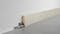 Fußleiste Exquisit - Basalto Bianco - 58 mm Produktbild Wohnzimmer - Urban mit Wohnwand zoom